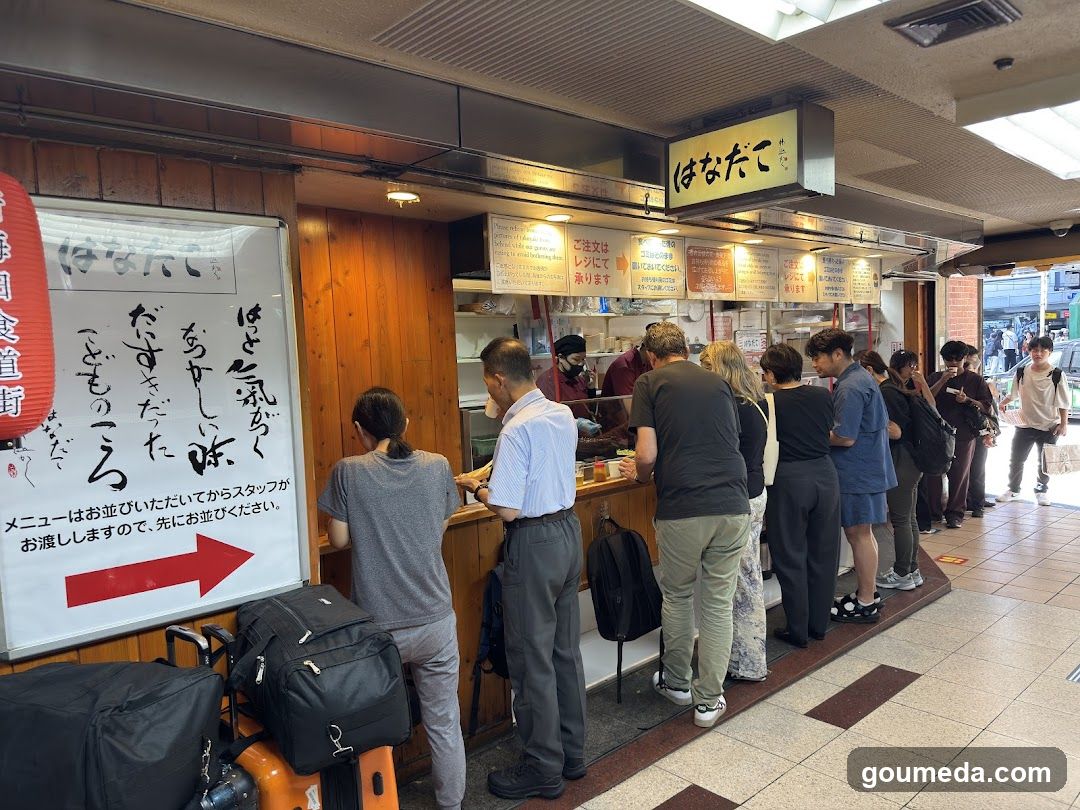 Queuing at a Japanese food stall