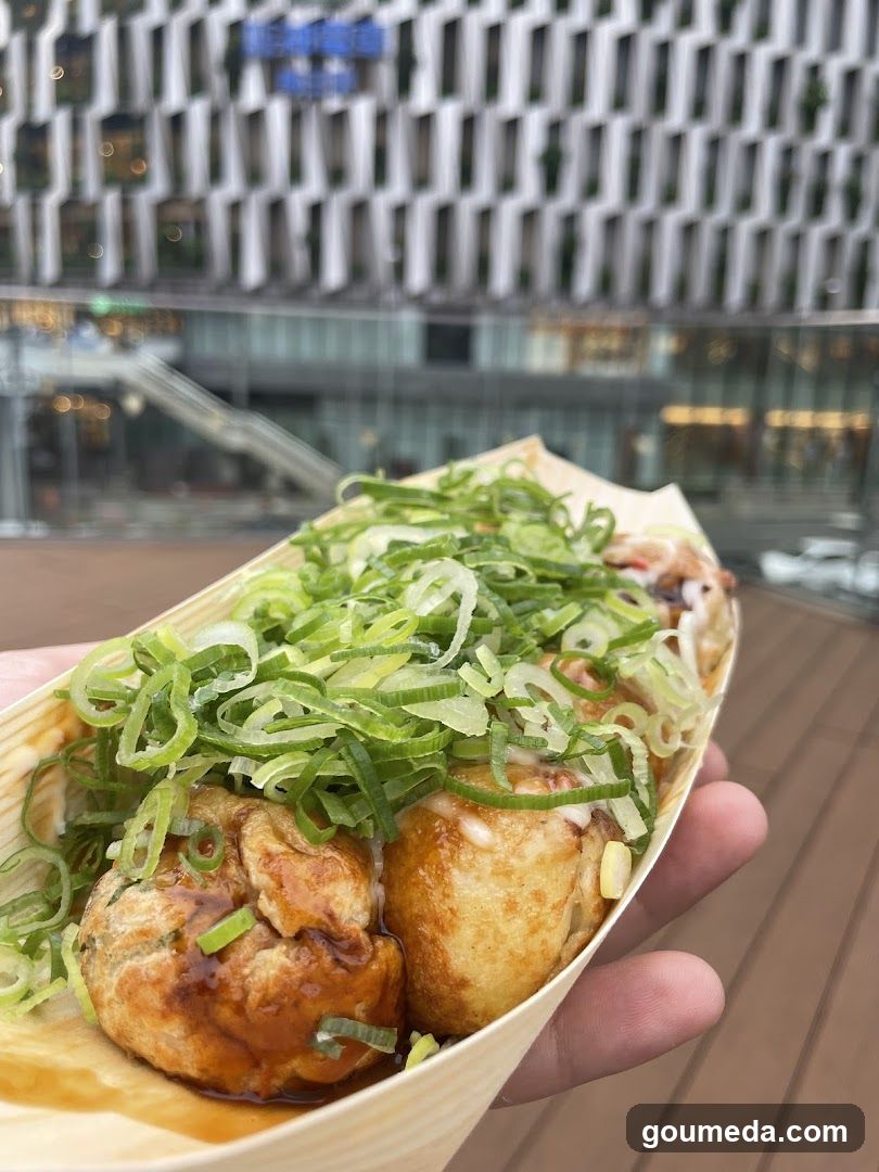 Okonomiyaki in a boat-shaped container