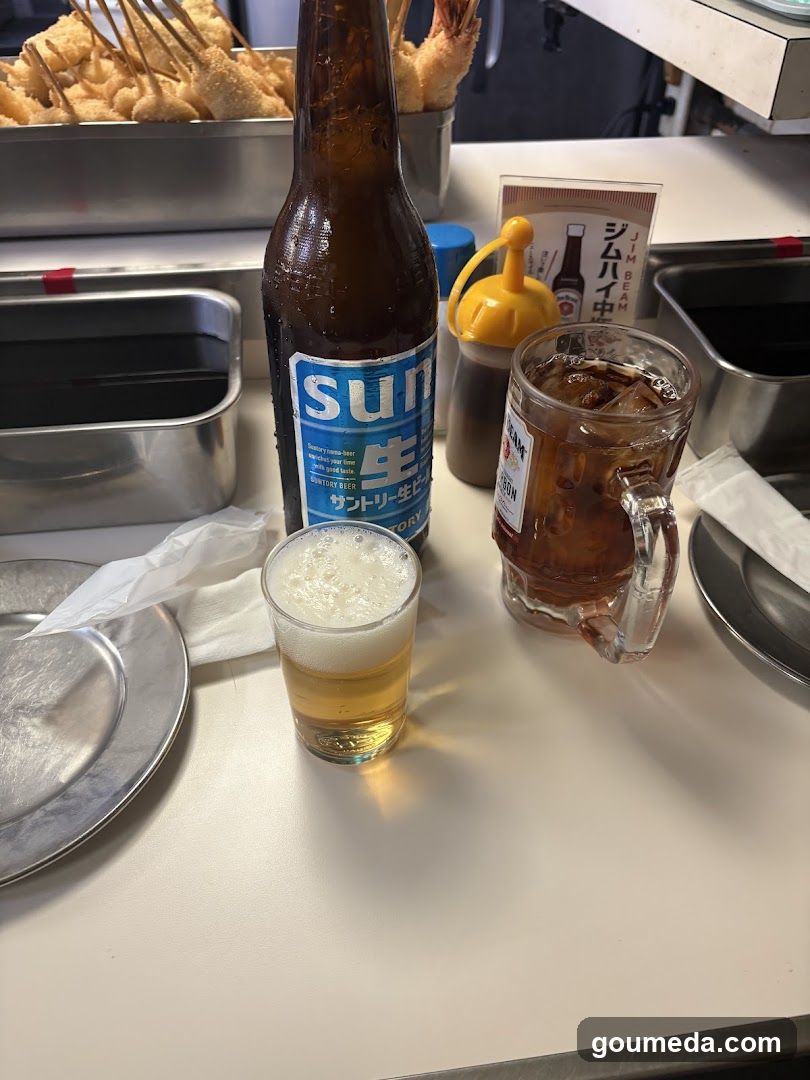 Beer and Food at a Restaurant Table