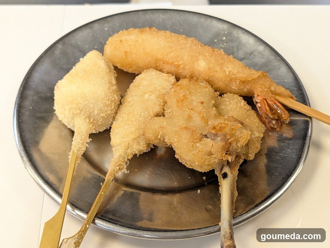 Fried Seafood Skewers on Metal Plate