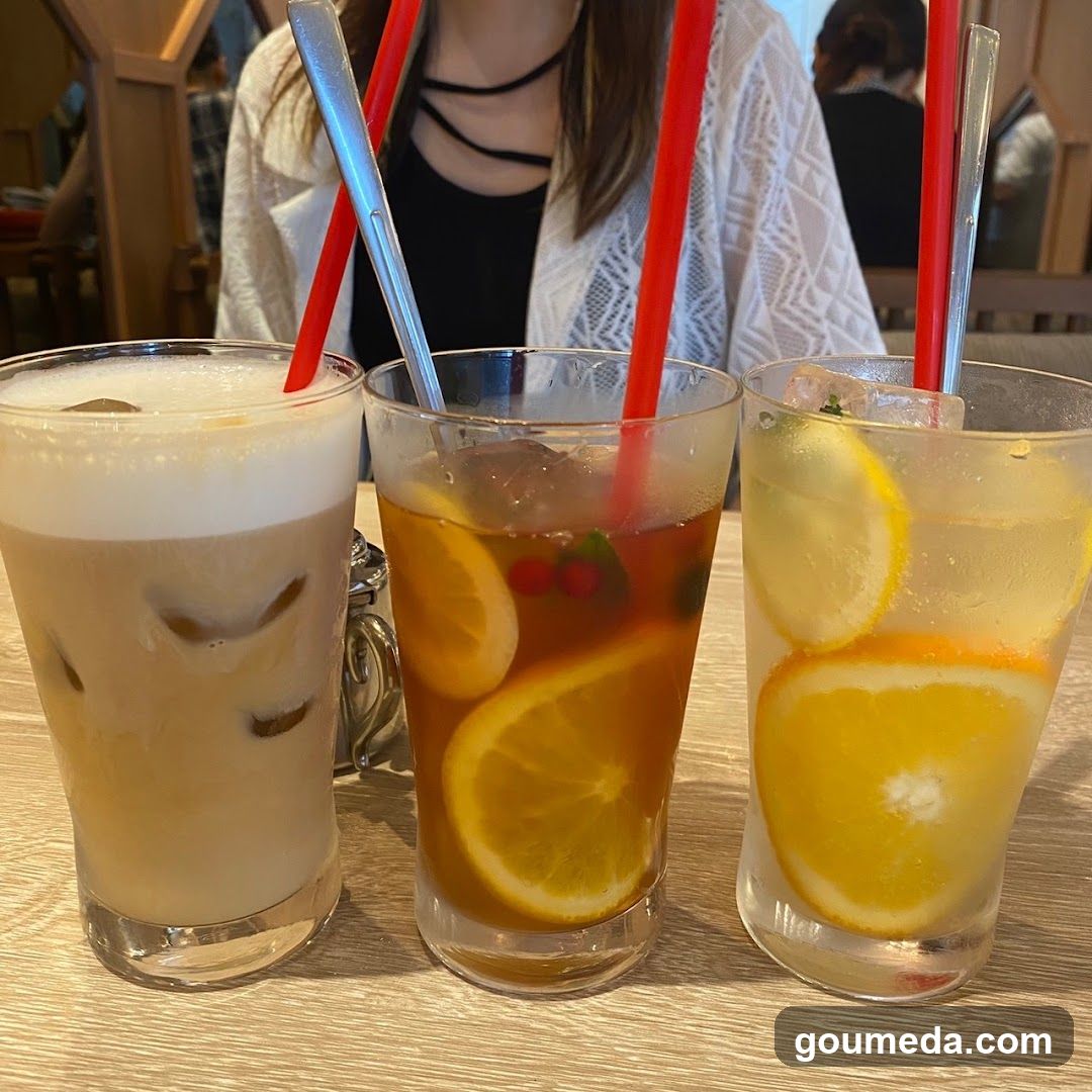 Three Iced Drinks with Straws