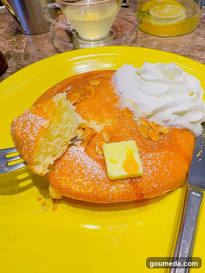 Orange Pancake with Whipped Cream and Butter