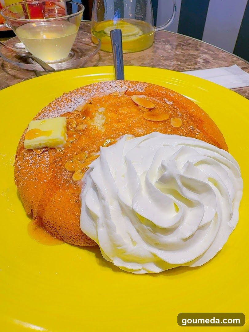 Pancake with Whipped Cream and Almonds