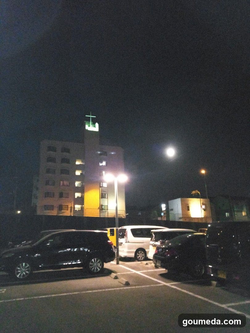 Night Parking Lot with Church Building