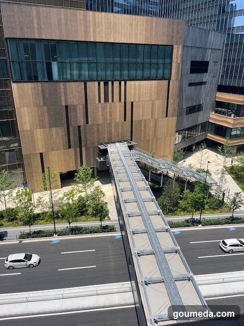 Modern Building Exterior with Pedestrian Bridge