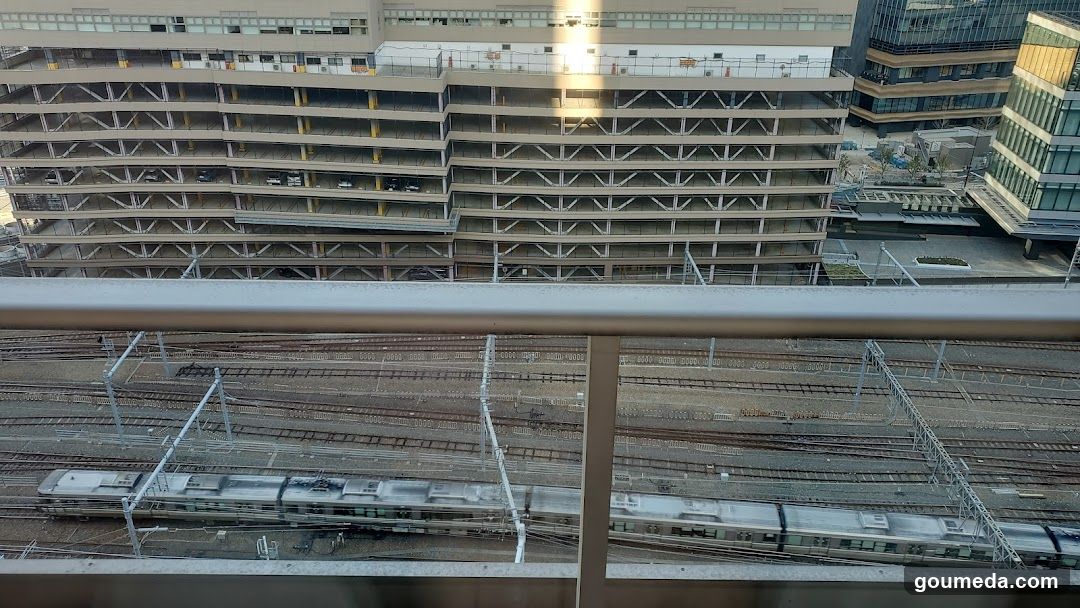 Train Tracks and Parking Structure View
