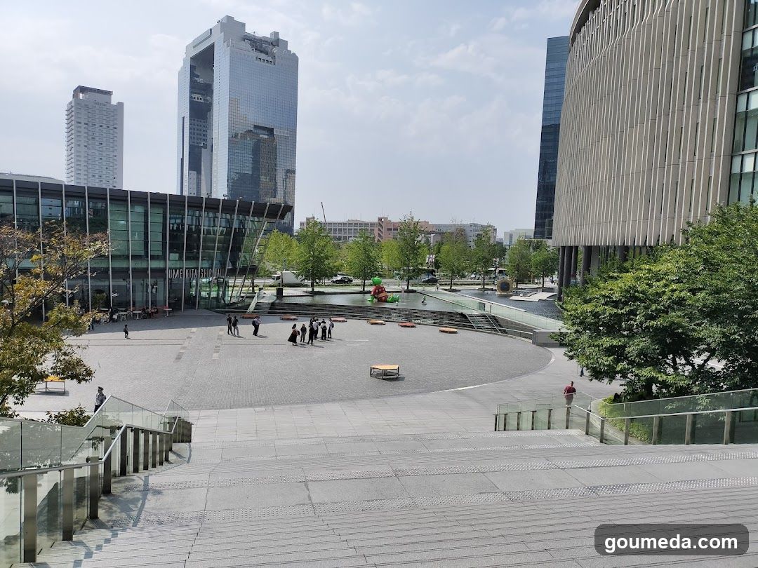 Urban plaza with modern architecture and pedestrians