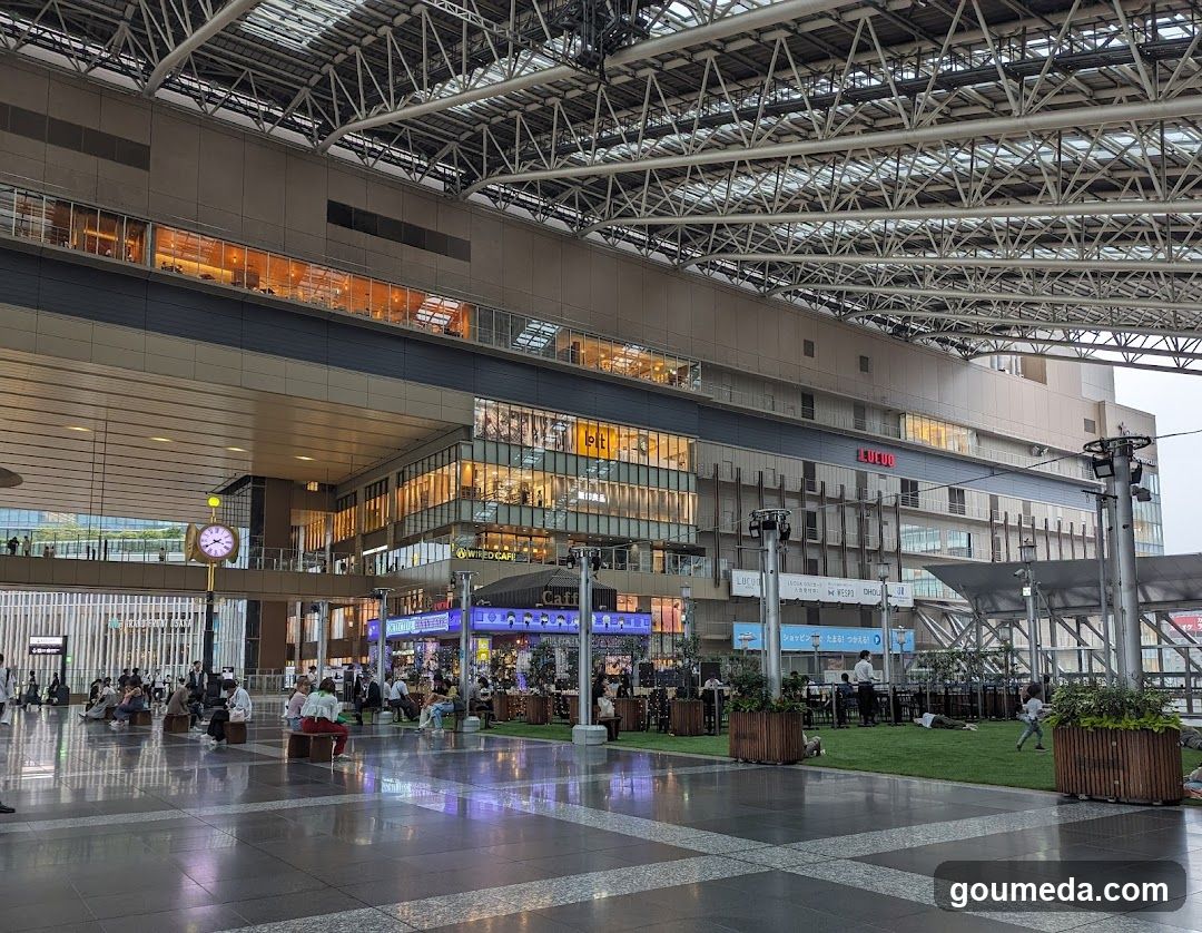 Station Interior with Shops and People