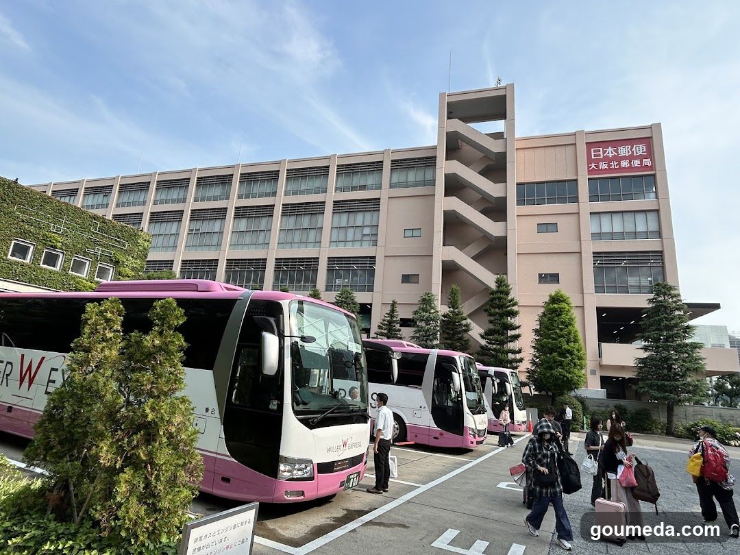 Bus Terminal Exterior with Passengers