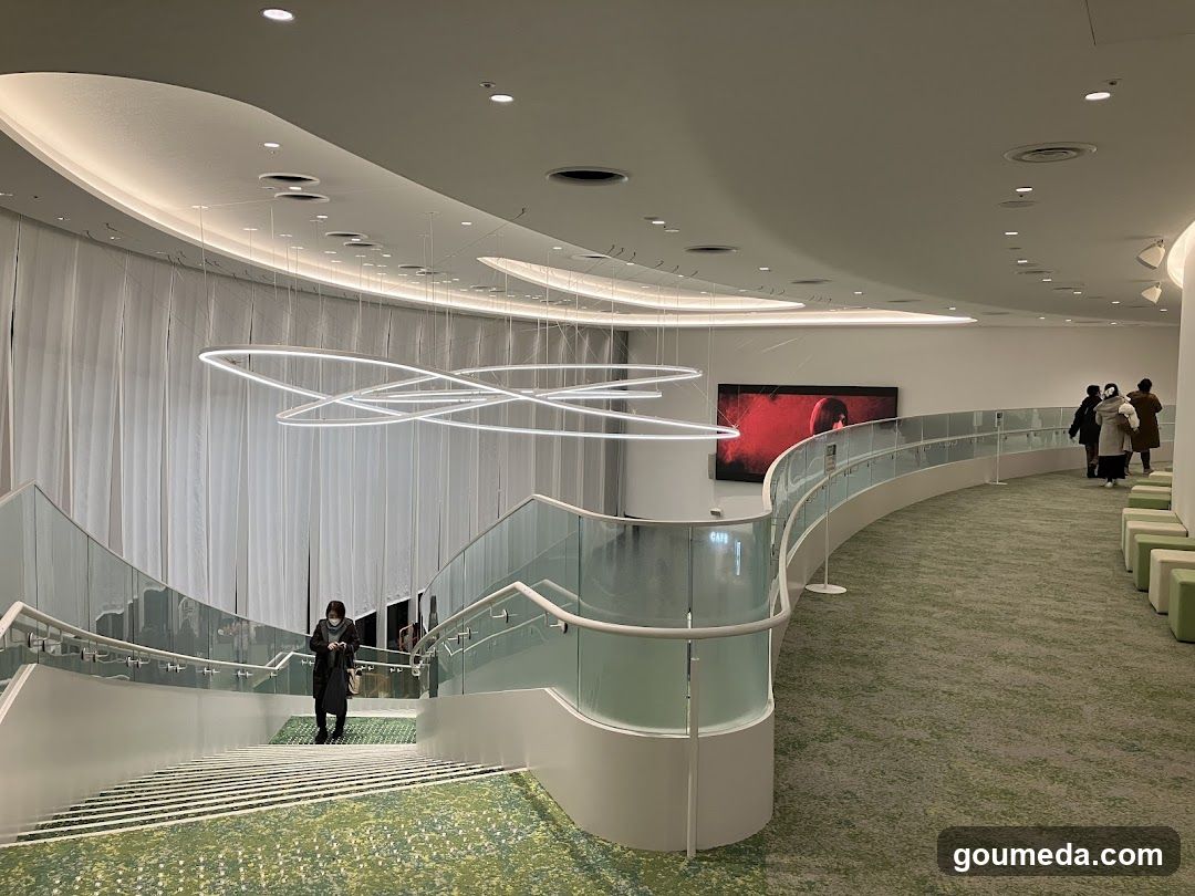 Modern Interior with Staircase and Art Installation