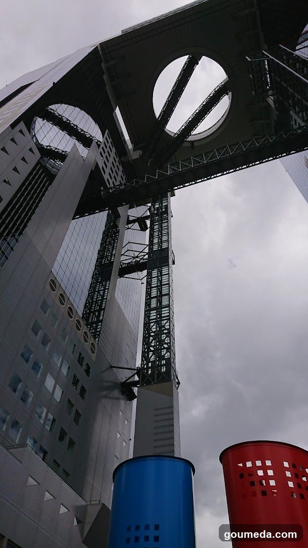 Elevated structure with colorful cylindrical objects