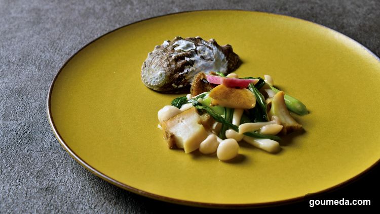Oyster and Mushroom Dish on Yellow Plate