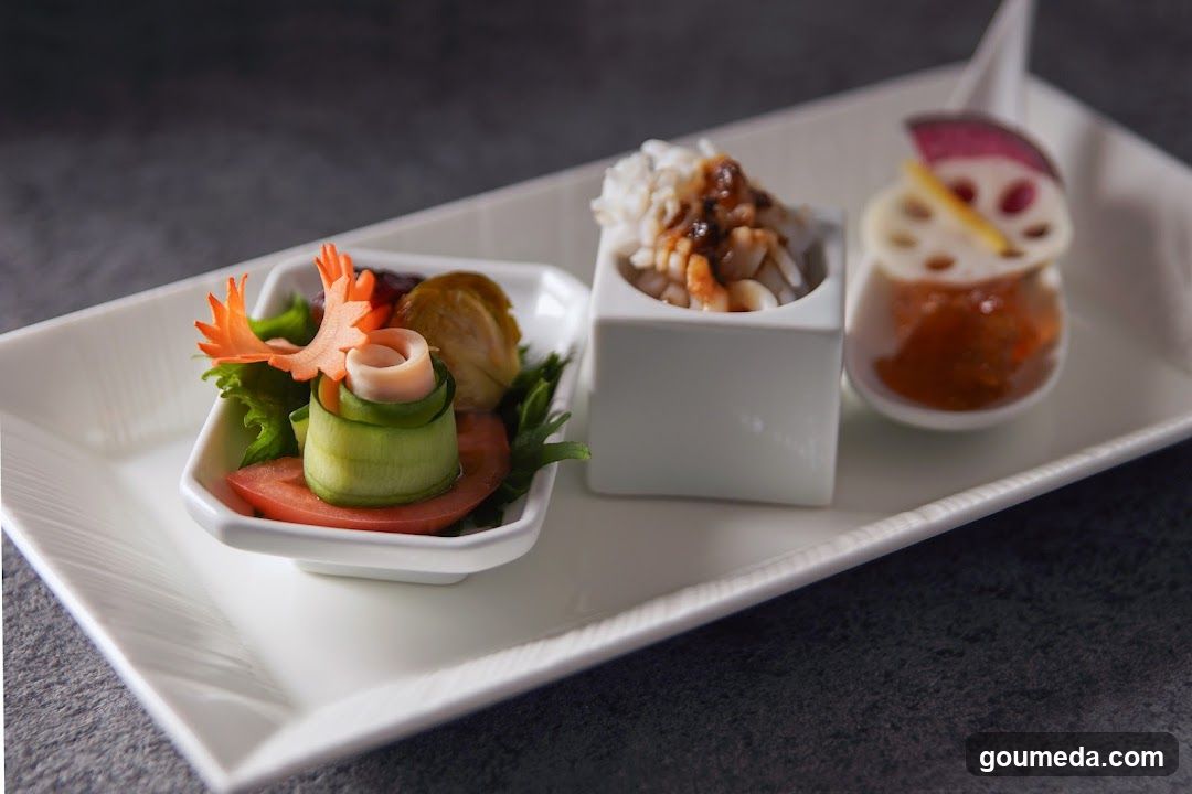 Assorted Appetizers on a White Platter