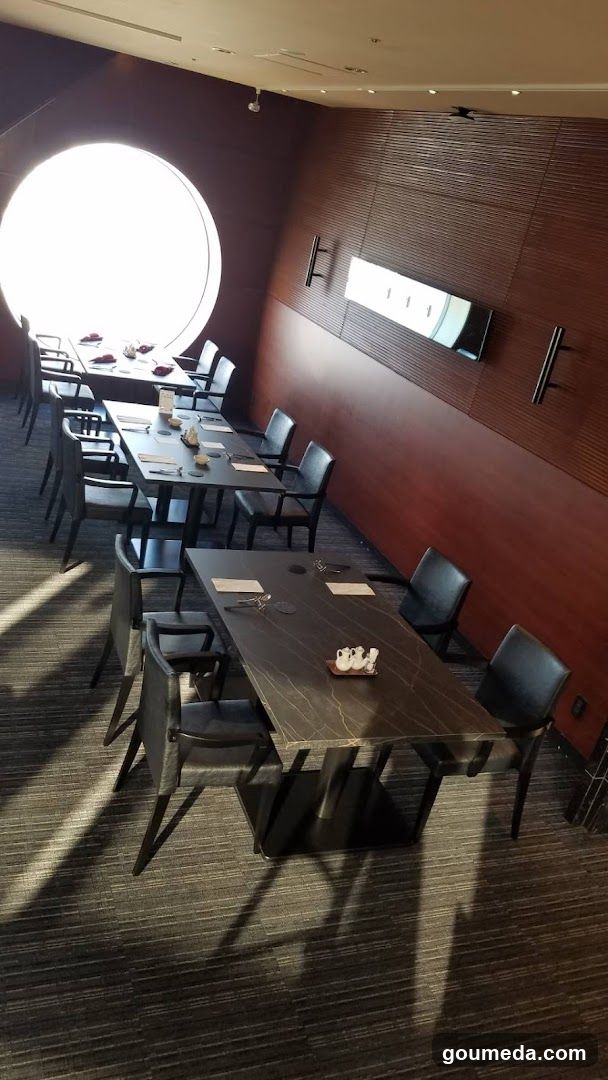 Modern Dining Interior with Circular Window