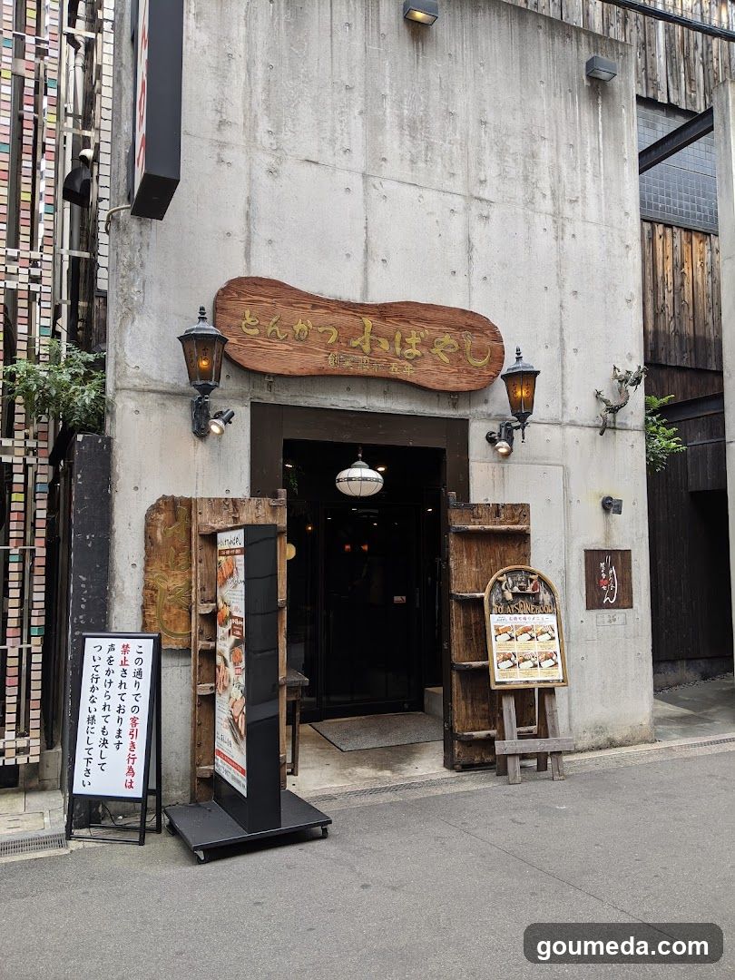 Restaurant Entrance with Wooden Signage and Exterior Decor