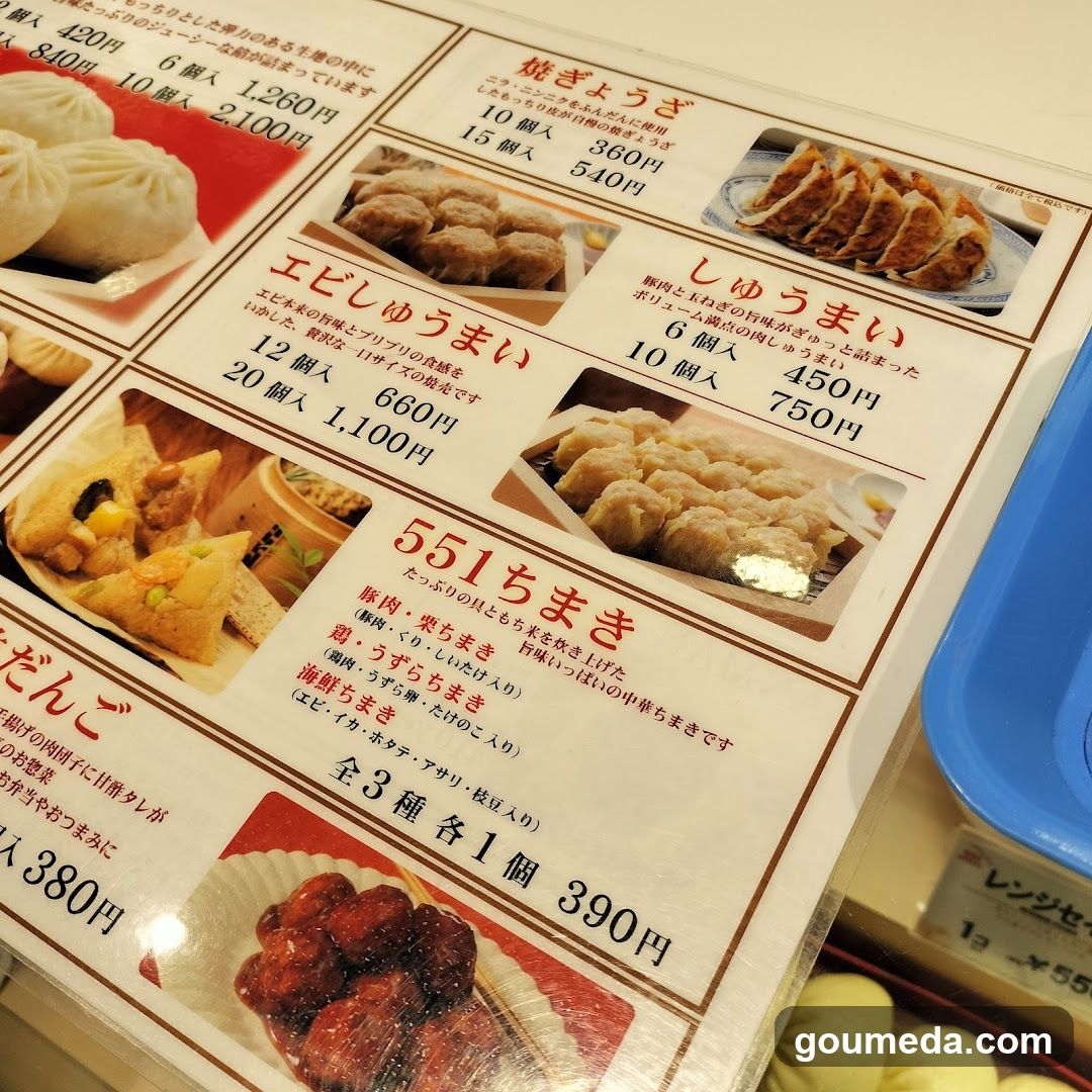 A close-up of a printed Japanese food menu featuring dumplings, gyoza, and other items with prices in yen.