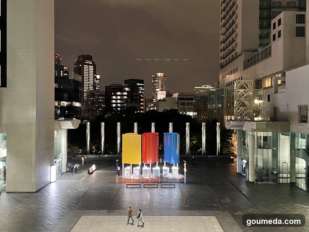 Night City Plaza with Colorful Sculptures