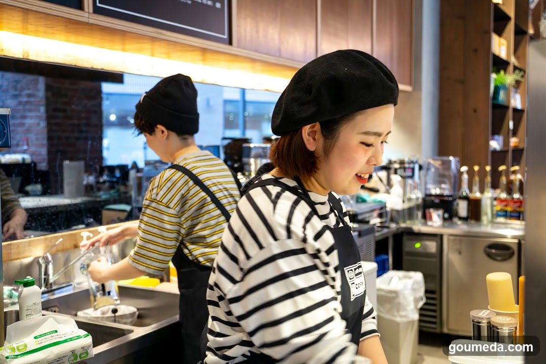 Barista at work in coffee shop