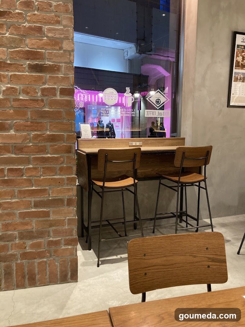 Interior Cafe View with Brick Wall and Bar Seating