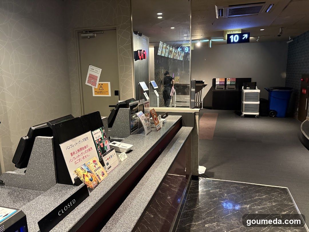 Interior of a modern establishment with self-service kiosks and signage