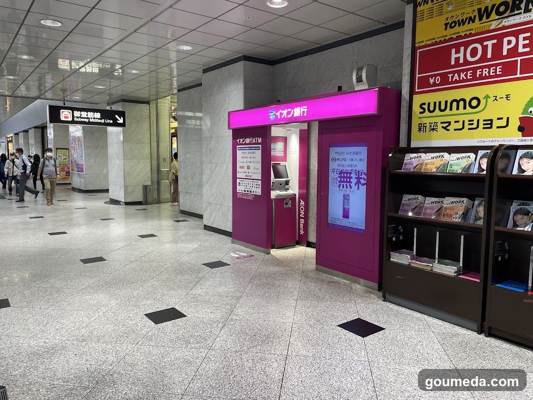 Station Interior with ATM and Advertisements
