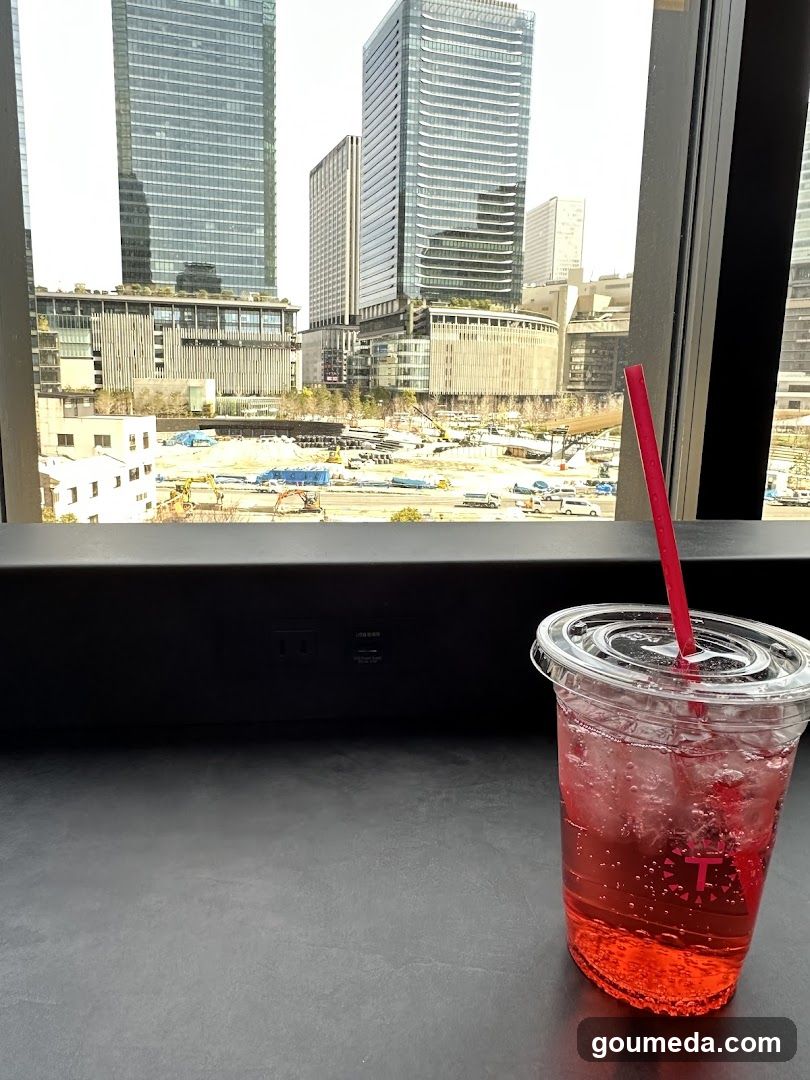 Red drink with city view