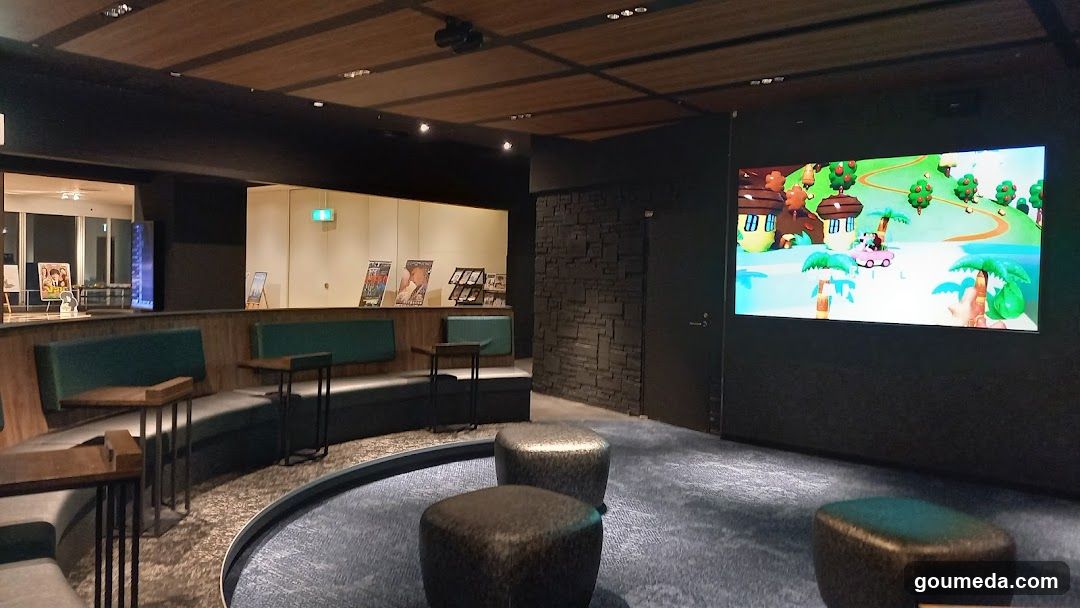 Lobby with Movie Screen and Seating Area