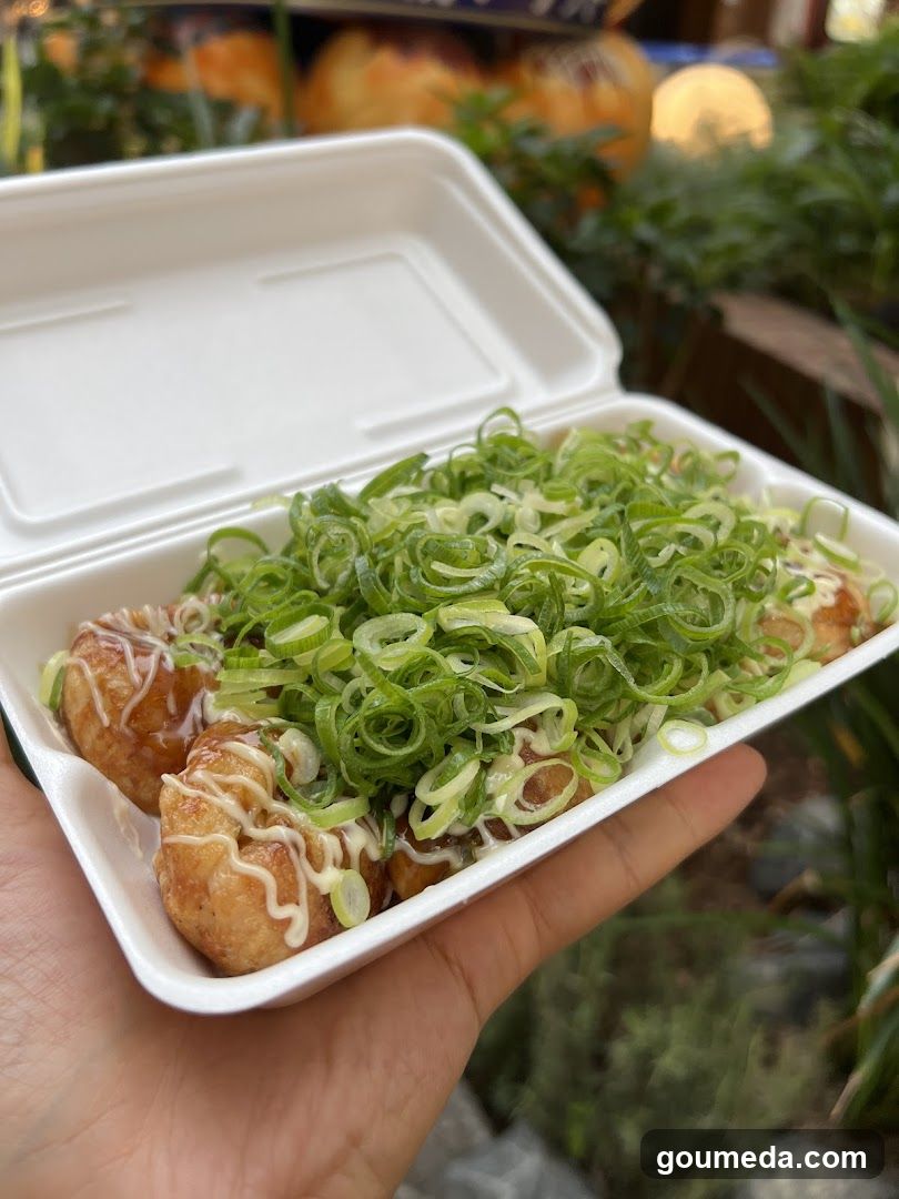 Takahito Okonomiyaki in a Takeout Container