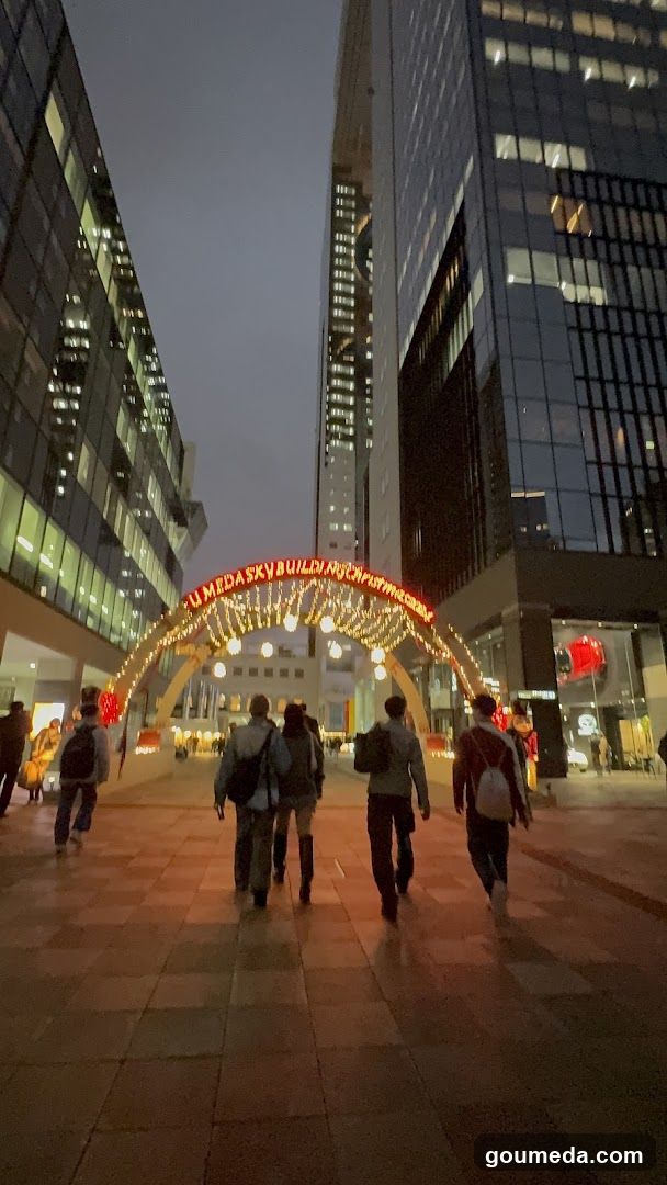 Urban Night Scene with Pedestrians