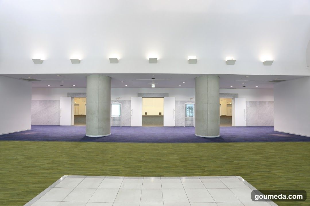 Interior Hallway with Columns and Carpeting