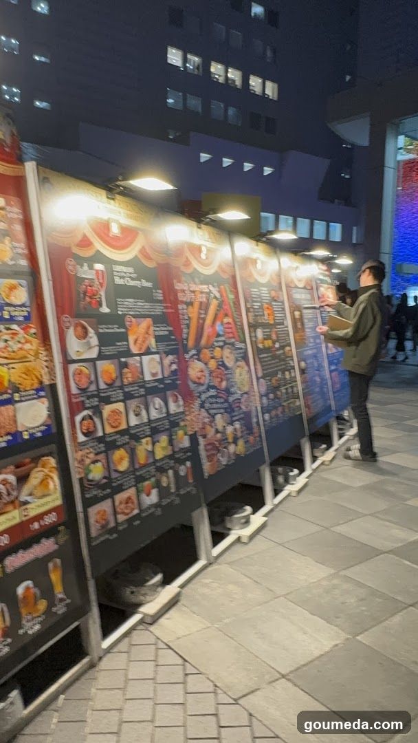 Outdoor Menu Display at Night