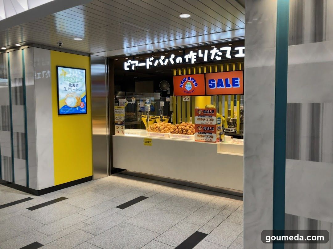 Food stall interior with display case and signage