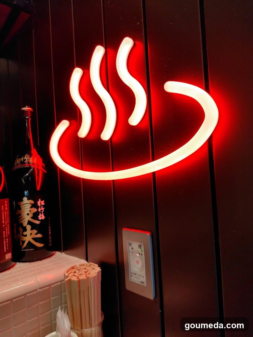 Neon Steam Sign and Sake Bottle