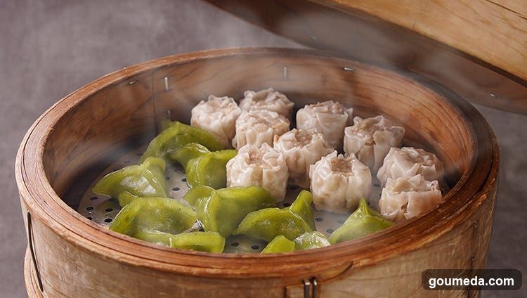 Steaming Dumplings in Bamboo Basket