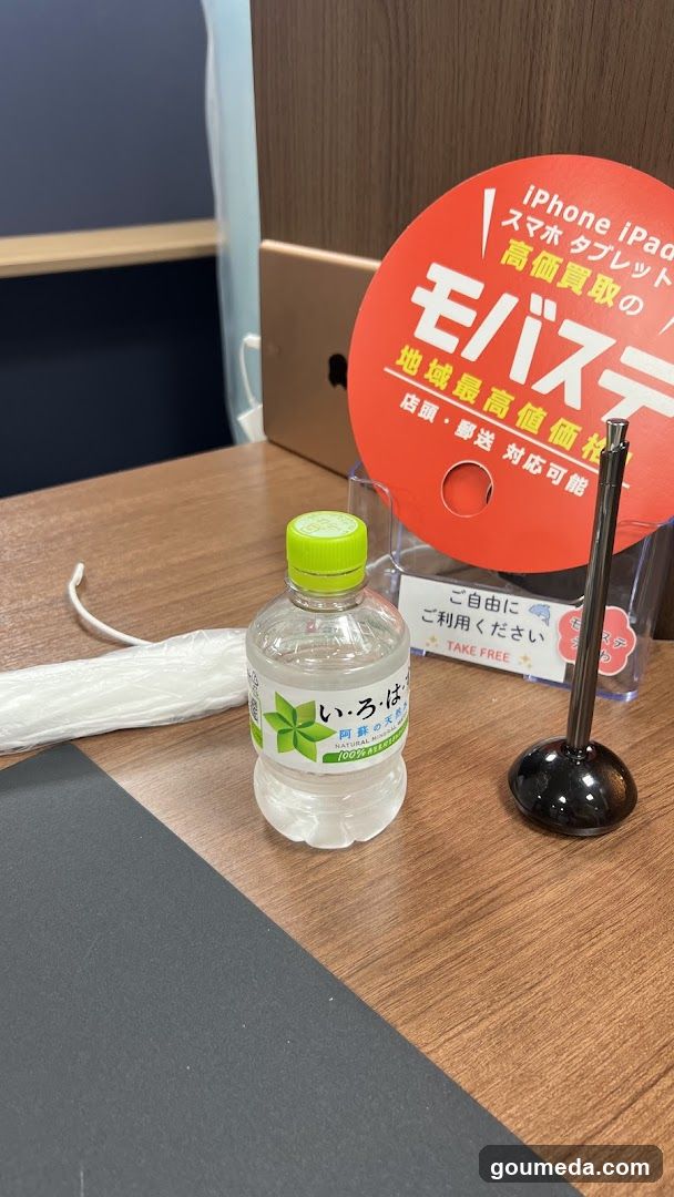 Bottle and Sign on Table