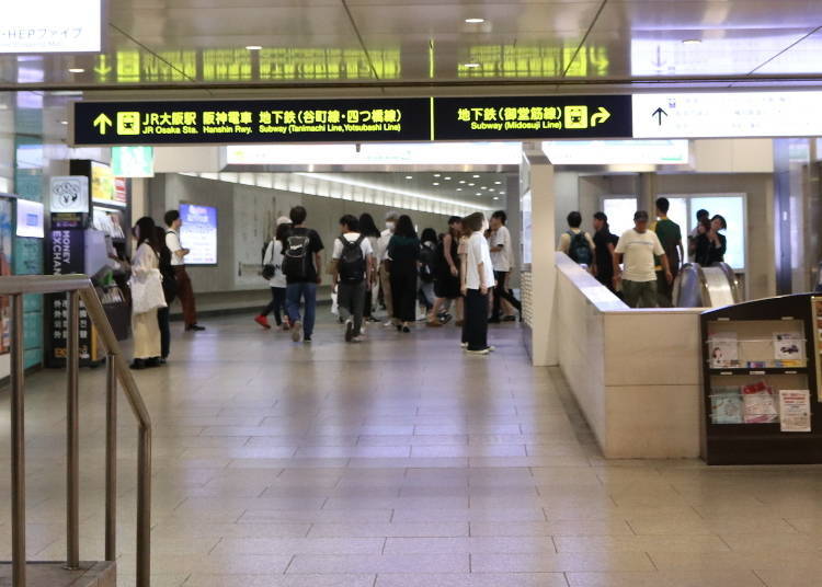 Signage and ceiling direction markers inside Grand Front Osaka near Osaka Station